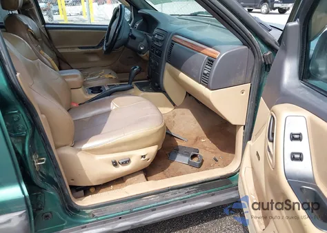 1999 Jeep Grand Cherokee Laredo z USA, uszkodzony, nr VIN 1J4G258S7XC564419